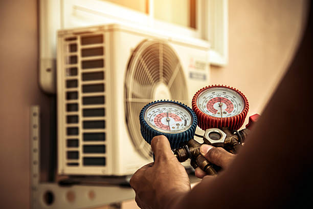 Professional Air Conditioning Service technician working in Leeds, NY